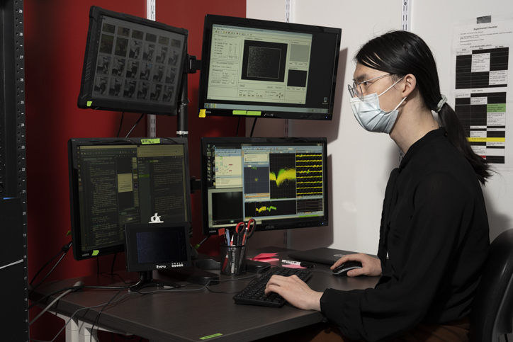 Scientist looking at the computer screen